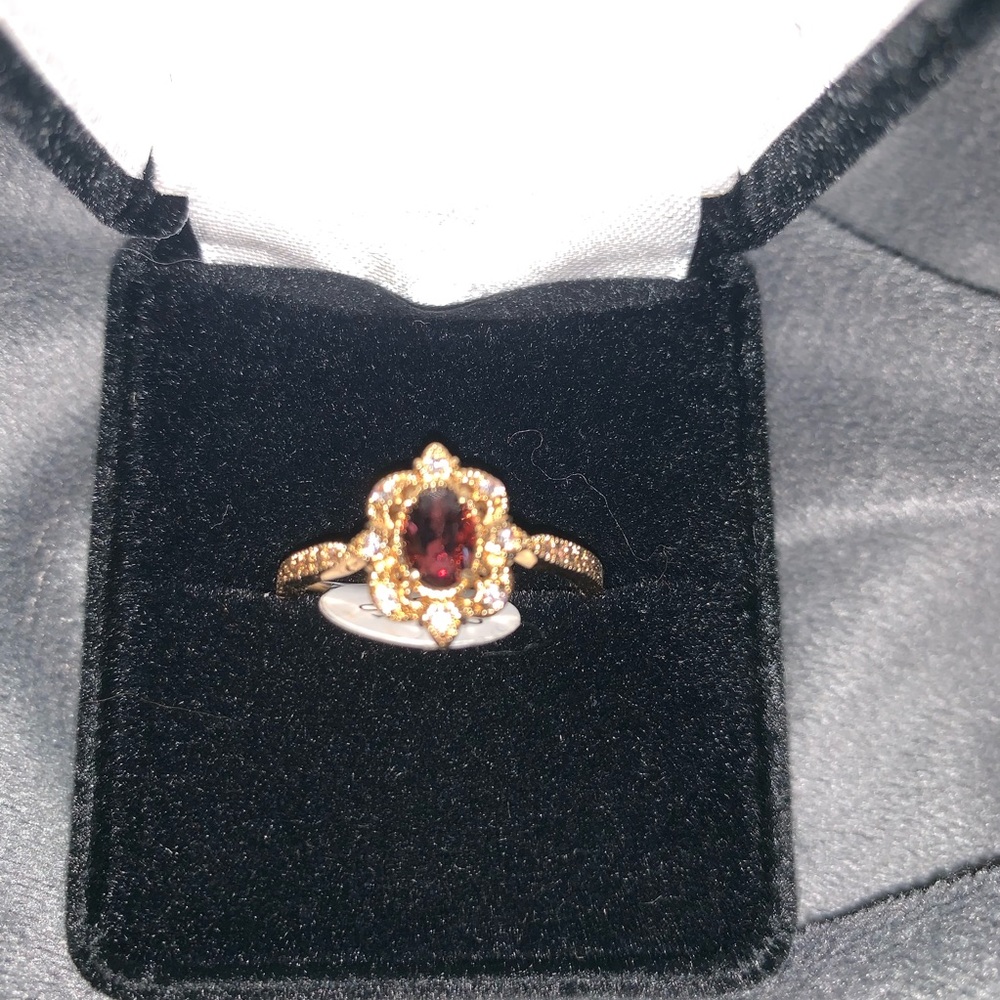 Burgundy stone ring from fragrant Jewels. Size 10